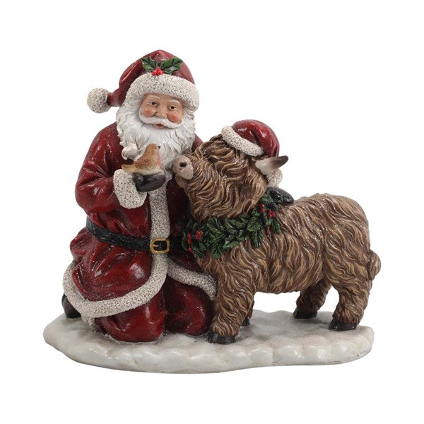 Santa Cuddling A Highland Cow Ornament 25 x 26cm