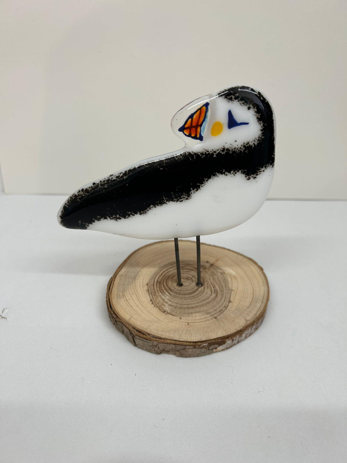 Puffin looking back Glass Ornament